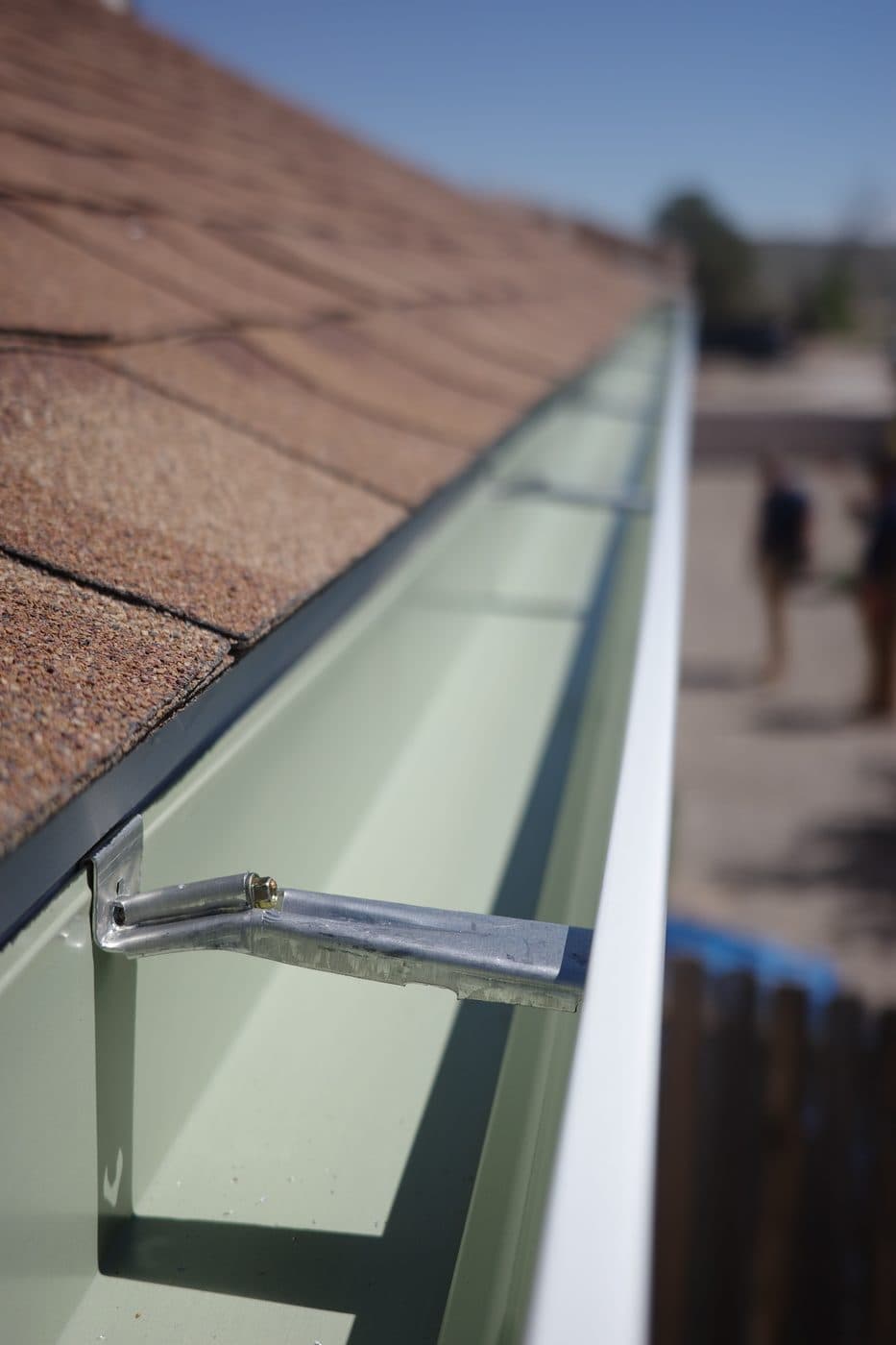 Finished seamless gutter and hidden hanger bracket on an Albuquerque home